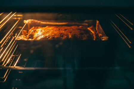 Warm light cheese cake in the ovenの写真素材