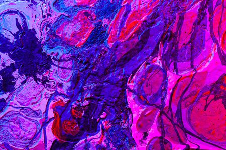Texture of dried paint in neon light. Abstract background