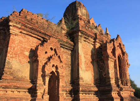 Old pagoda made of brick viewed at sunset at Bagan, Myanmarの写真素材