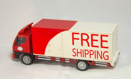 Red white truck with Free Shipping text isolatedの写真素材