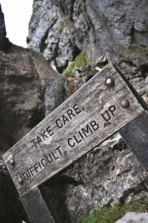 Warning sign in mountains.の写真素材