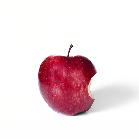 A red apple bite.の写真素材