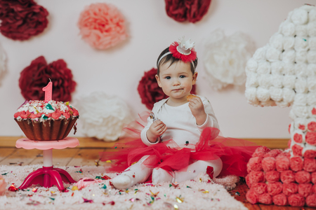 Happy little princess at pink girls partyの写真素材