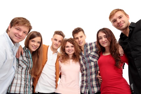 Casual group of excited friends isolated on whiteの写真素材