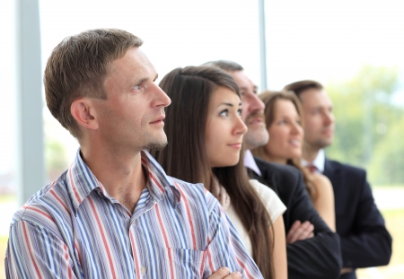 business team standing in a row at office and looking upwards - Successful business teamの写真素材