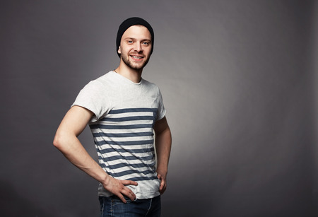 Portrait of young handsome man in t-shirt.の写真素材