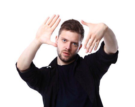 Casual young man looking at cameraの写真素材