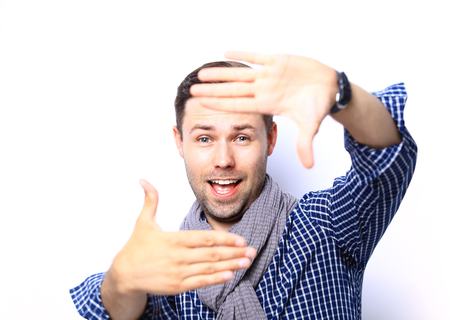 Handsome casual man smiling - isolated over a white background