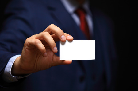blank visiting card in business man handの写真素材