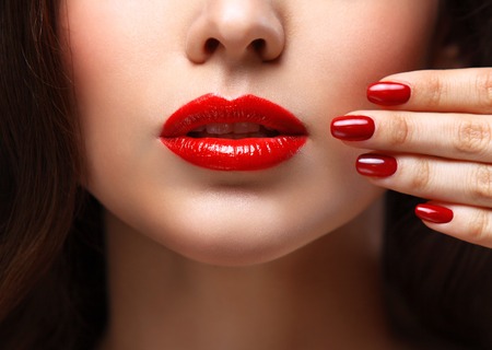 Red Sexy Lips and Nails closeup.の写真素材