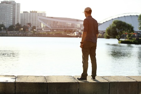 portrait of a trendy young man in the city