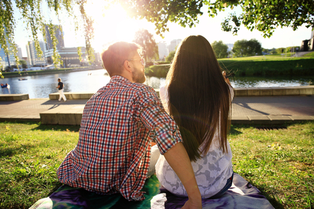 Portrait of a loving couple watching the sunsetの写真素材
