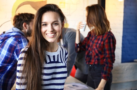 Modern business woman in the office with copy spaceの写真素材