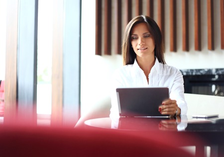 Business woman working in office with documents.の写真素材
