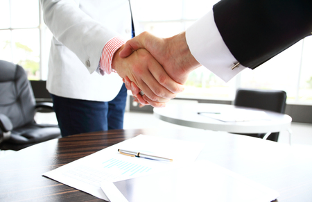 Business people shaking hands, finishing up a meetingの写真素材