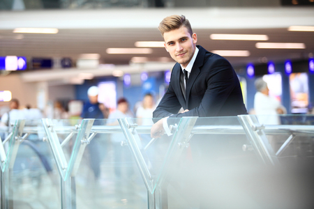 Handsome smiling confident businessman portraitの写真素材