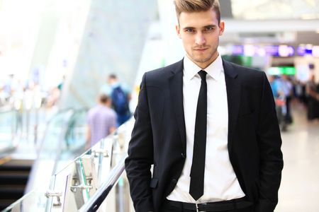 Handsome smiling confident businessman portraitの写真素材