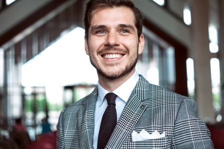 Smartly dressed businessman, smilingの写真素材