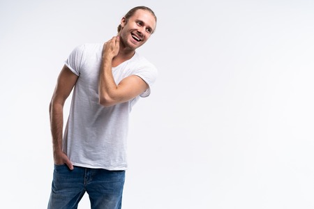 Handsome young guy posing in studio - isolated.