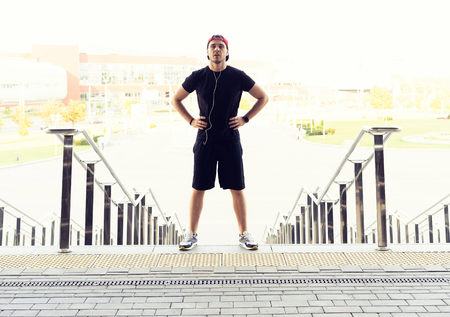 Urban man prepare to jogging in the city. Working out urban