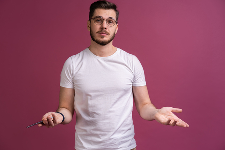 Portrait of happy fashionable handsome man in shirt looking at cameraの写真素材