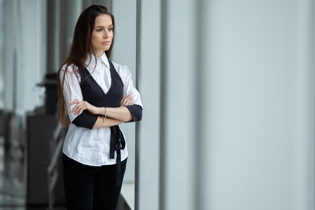 Modern business woman in the office with copy space.の写真素材