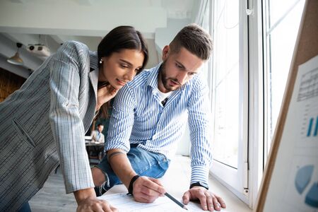 Coworkers team picture in modern office. Project managers work new ideaの写真素材