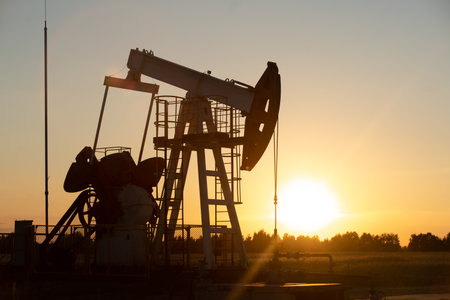 Oil Pump on orange sunset.の写真素材