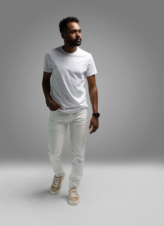 Handsome young african american guy posing in studio - isolated.の写真素材