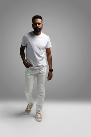 Handsome young african american guy posing in studio - isolated.の写真素材