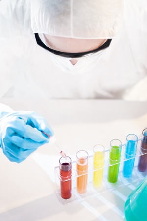 Several Samples in Test Tubes and Pipette in Handの写真素材
