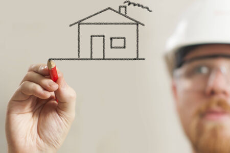 Engineer Sketching House with Carpenters Pencilの写真素材