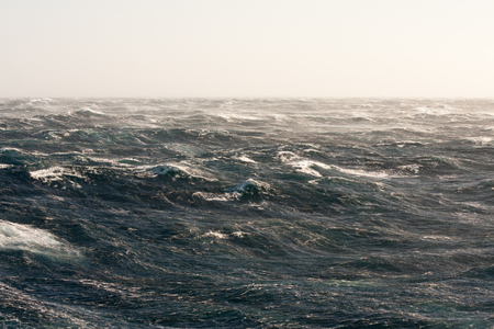 Stormy Winds Breaking Crests and Forming Streaks of Foamの写真素材
