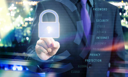 Businessman Pushing Lock Icon of Virtual Touchscreen in Internet Security Concept Image