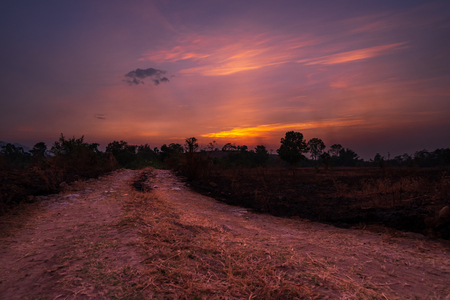 Orange skyline view with mountain at sunset and beautiful sky.の写真素材