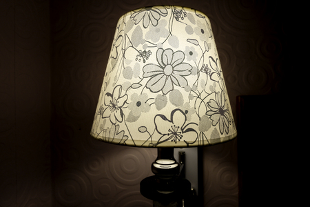 Ancient lamps shine in the bedroom at night.の写真素材