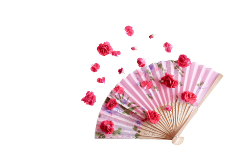 Paperfan Sprinkle with red roses,Chinese blow,Japanese fans,Wood blower, Ancient paper isolated on white backgroundの写真素材