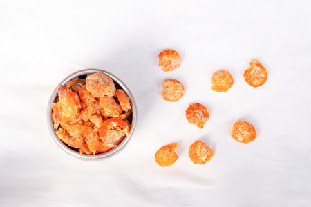 Dried shrimp or dried seafood put on white cloth.の写真素材