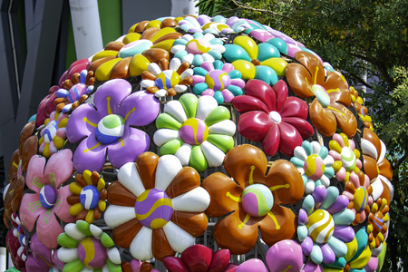 Large colorful flower balls have been decorated in front of department stores to beautify the outdoor location beautifully.の写真素材