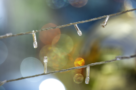 Many Small bulbs on blurred backgrounds are decorated in Christmas and New Year. Close up of Light bulb decoration during the festive season.の写真素材
