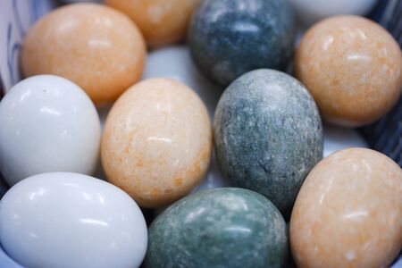 colorful egg-shaped jade stone used to decorate the house.