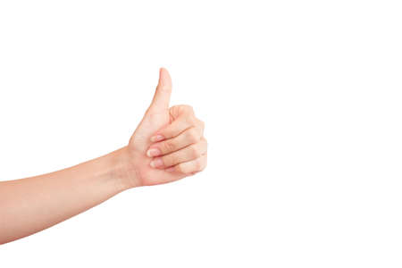 A woman's hand with a thumbs up isolate on a white background. Clipping path.の写真素材