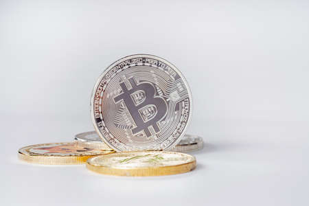 Maesot, Thailand- June 5, 2021:Pile of Bitcoin or coins of cryptocurrency symbol on white background. Concept of blockchain system crisis.のeditorial素材