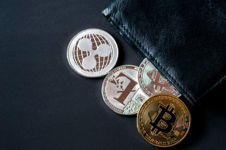 Mae Sot, Thailand- June 5, 2021:Pile of Bitcoin and wallet it's coins of cryptocurrency symbol. Concept of blockchain system crisis.のeditorial素材