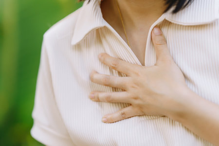 Women experience chest congestion due to suffocation. Health care concept.の写真素材