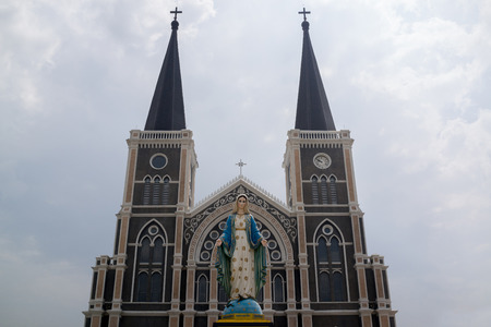Chantaburi Thailand  April 18 2015: Mary statue stands in front of historic Catholic church in Chantaburi Thailand.のeditorial素材