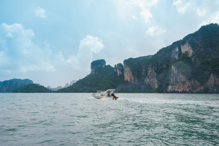 Krabi, Thailand - August 6, 2016: Old boat carries tourists in Krabi, Thailand.のeditorial素材