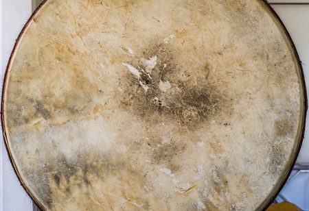 Texture of old brown Thai traditional leather drumhead.
