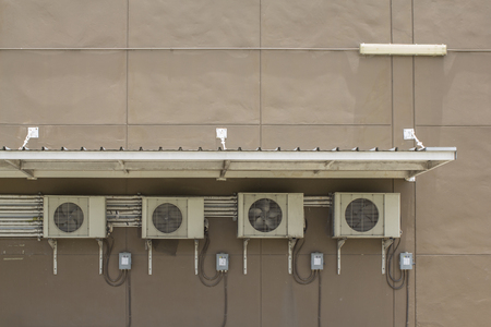 Old air compressors is located behind the office room.のeditorial素材