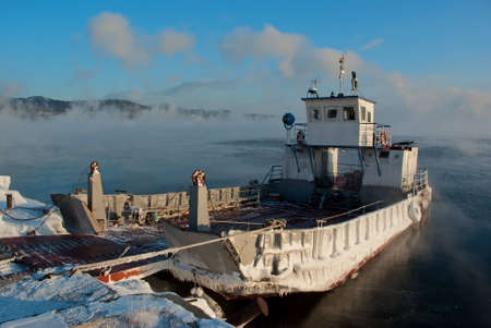 Ferryboat moored at pier in a winter mornings